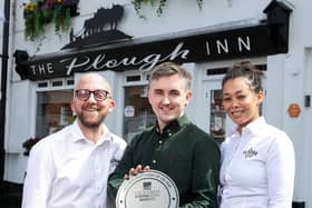 Plough Inn Hillsborough voted Best Bar in Northern Ireland…Pictured with the LCN plaque for Best Bar in Northern Ireland are (from left) Keith Johnston (Manager, Plough Inn), Sean Paul Hayes (Assistant Manager, Plough Inn) and Jess Njoroge (Café Manager, Plough Inn).