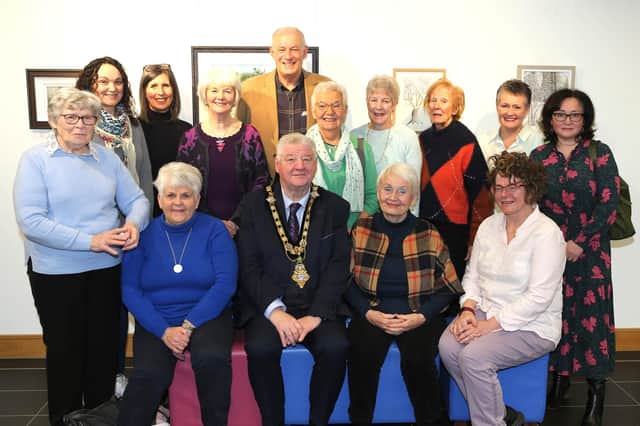 The Mayor of Causeway Coast and Glens, Councillor Steven Callaghan pictured alongside members of Limavady Art Group and friends who attended the opening of their Winter Exhibition in Roe Valley Arts and Cultural Centre. Credit Causeway Coast and Glens Council