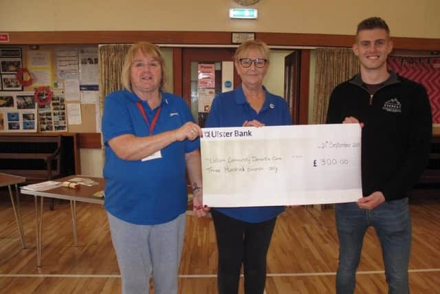 Everest Accountants & Financial Consultants recently donated £300 to Lisburn Dementia Care. Pictured are Janet Leathem volunteer, Maureen Doran, founder of the group and Aaron Dalzell of Everest Accountants. Pic credit: Lisburn Dementia Care