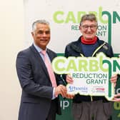 Kailash Chada (Chief Executive Officer at Phoenix Energy), Larne-based installer Derek Foster and Terry Waugh (Chief Executive Officer at Action Renewables). (Pic: Justin Kernoghan).