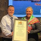 Anna Classon, RNLI Head of Region, attended the ceremony in Portrush where Station Mechanic Dave Robinson was celebrated locally for being accorded a Thanks of the
Institution Inscribed on Vellum, for his actions in saving the life of a teenage boy in the sea off Portstewart Head in 2020.