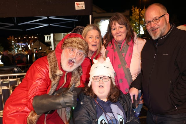 Santa Claus pictured at the Ballyclare Christmas switch-on with Chloe McKnight, Lindsay McKnight, Carole Scott and Trevor Lightowler.