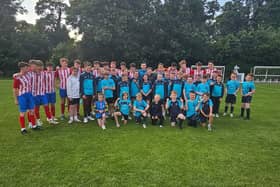 The West Cork team with members of Bushmills Utd FC Youths. CREDIT BUSHMILLS YOUTHS