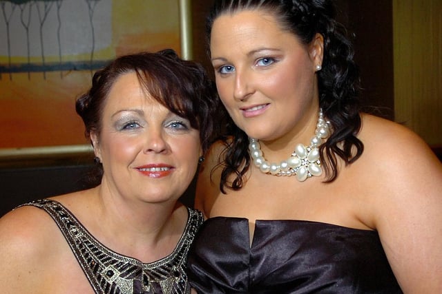 Patricia McIvor and Leanne Patterson pose for our lensman at the Tesco Cookstown charity formal in 2010.