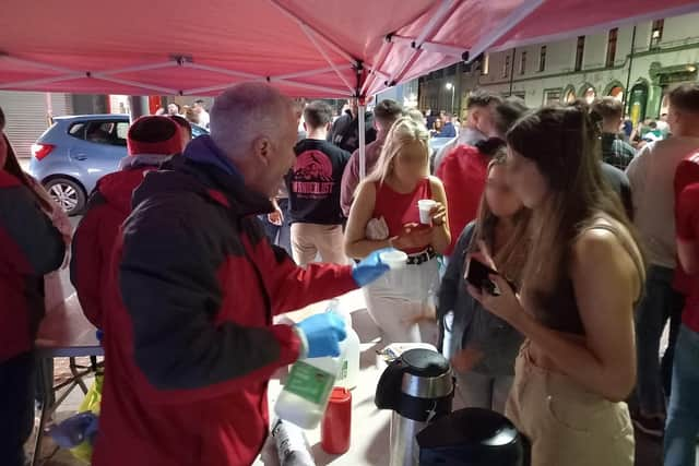 Andy Burns and the street chaplains in action. Picture: ROCK Street Chaplains