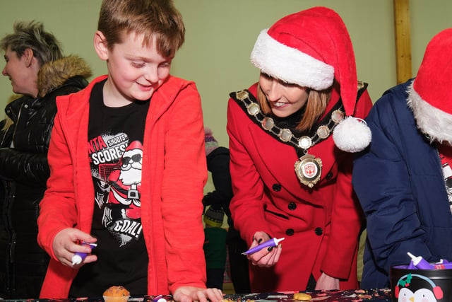 Chair of Mid Ulster District Council Cora Corry helps with the decoration making at the festive event in Maghera.