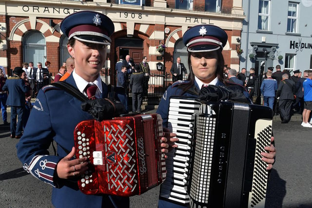 Pride Of The Birches Accordion Band members, Charlotte Carberry, left, and Connie Cumberland pictured before setting off on parade on Thursday. PT28-302.