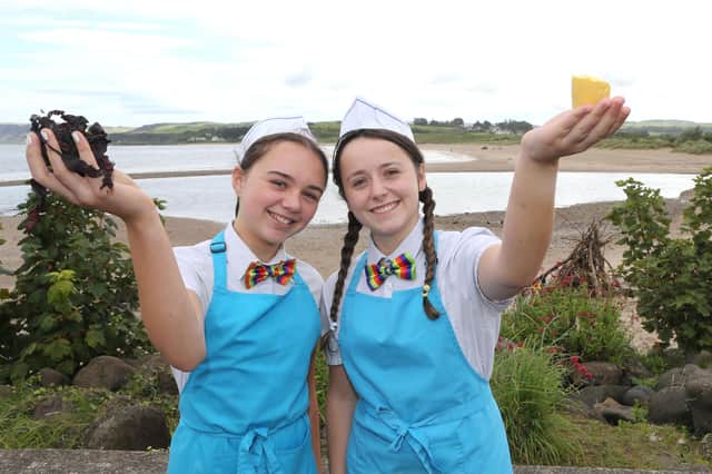 Ellie McGarry and Orla McHenry try some dulse and yellow man from the Dessert Bar in  Ballycastle, a family business that has been procuring dulse and making yellow man for generations.