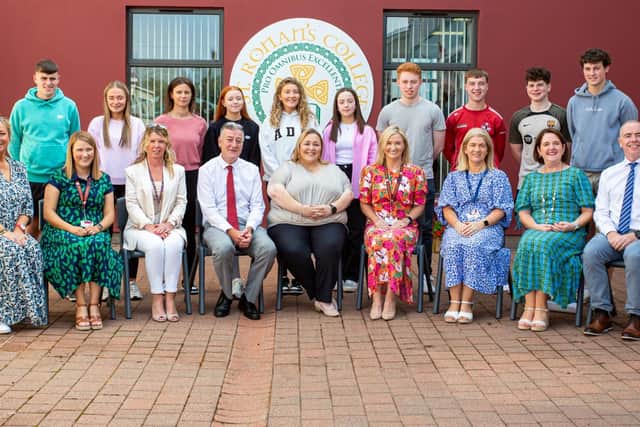 St Ronan's College, Lurgan staff pictured with pupils who received top A2 grades 3A-A.