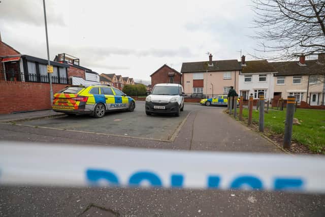 Officers at the scene of the incident in the Greenan area of Belfast on January 9. Picture by Matt Mackey/PressEye