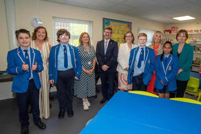 Staff, pupils and special guests pictured at the official opening of 'The Orchard' special provision at St John the Baptist's College on Thursday. Picture: Tony Hendron