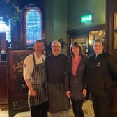 Heather McKeown (second right), from the Housing Executive, says a big thank you to Mary’s Bar staff  Jimmy Graham, Peter Devlin and Sharon McElwee.