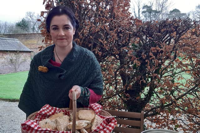 Bronagh Duffin of Bakehouse with a basket of freshly baked soda bread flavoured with wild garlic foraged from local woodlands.