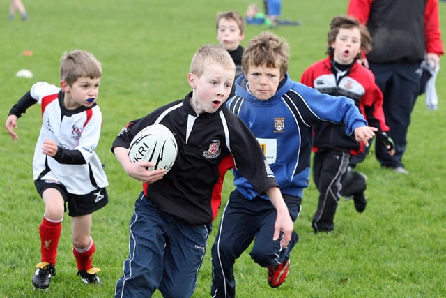 Going for a try at the Coleraine Mini Rugby Tournament back in 2011.
