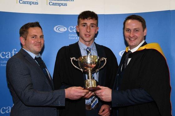 Ian Kennedy (Collone) was presented with the National Sheep Association Cup for performance in sheep production on the Level 3 Advanced Technical Extended Diploma in Agriculture by Alistair Armstrong (Regional Chair, NSA) and Mark Poots (Agriculture Lecturer, CAFRE).