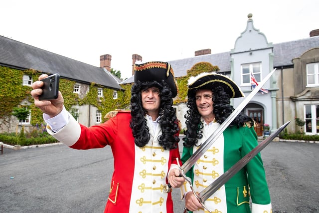 Rival monarchs William (John Adair) and James (John Adair) stop for a selfie before the annual Sham Fight at Scarva.