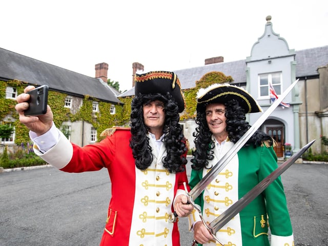 Rival monarchs William (John Adair) and James (John Adair) stop for a selfie before the annual Sham Fight at Scarva.