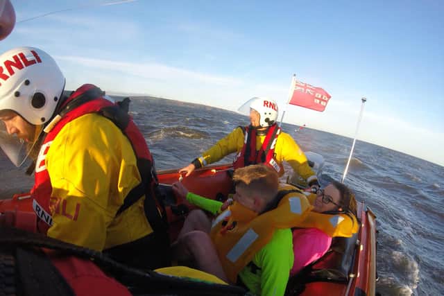The two rowers being transported back to the lifeboat station to get checked over. (Credit: RNLI)