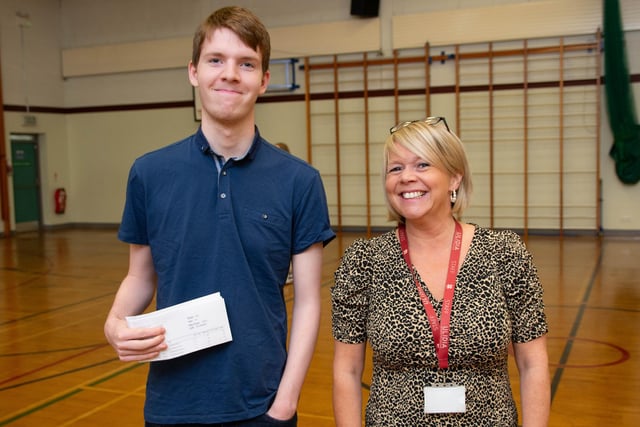 Finn Poag congratulated on his results by Vice-Principal Mrs Campbell.