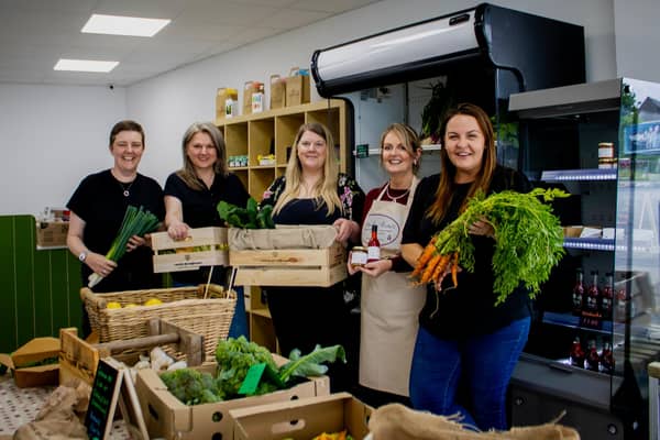 Some of the team at Carrick Greengrocers, a new co-operative that opened on West Street in the town.  Photo: Holly McKenzie
