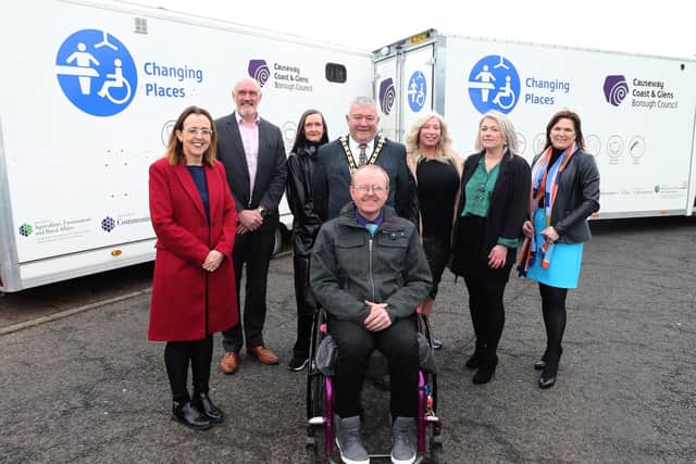 Pictured at Cloonavin with Causeway Coast and Glens Borough Council’s new Mobile Accessible Changing Units are Diversity Champion, Councillor Cara McShane, William Cameron (Department for Communities), Rhonda Williamson (Department for Communities), Elaine McConaghie (Policy Officer), Geraldine Wills (Town and Village Project Officer), Julienne Elliott (Town and Village Project Manager), the Mayor, Councillor Ivor Wallace, and Michael Holden (AccessoLoo Director).