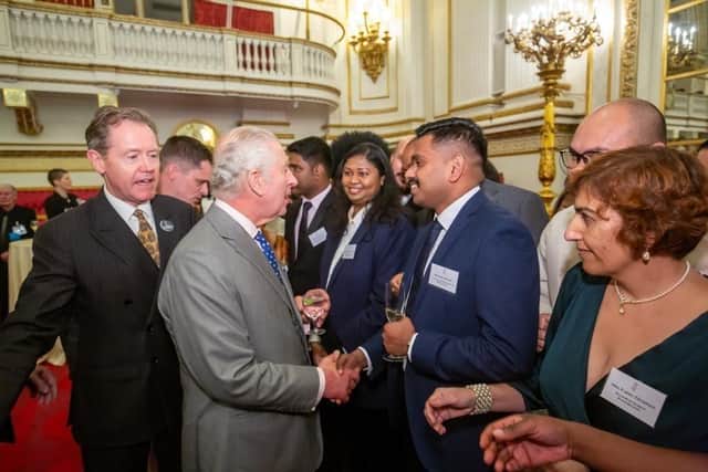 Rahul Rajesh meeting King Charles. Pic credit: SEHSCT