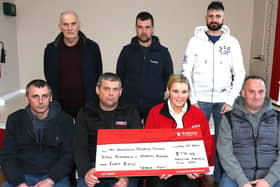 Members of Mosside Tractor Group presented a cheque over to Caroline Smith from Northern Ireland Air Ambulance. CREDIT KEVIN MCAULEY