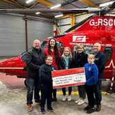 Representatives from The Resurgam Trust presented a cheque for £7700 to the Air Ambulance. Pic credit: Resurgam Trust