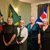 President of the Larne Branch UDR CGC Association, Patricia Bresland who paid tribute to the Greenfinches at the Coronation dinner with 3 former Larne Greenfinches from left, Angela Maybin, Mandi Buchanan and Ann Gove. Picture: Larne UDR Association.