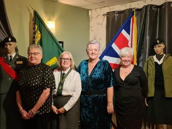 President of the Larne Branch UDR CGC Association, Patricia Bresland who paid tribute to the Greenfinches at the Coronation dinner with 3 former Larne Greenfinches from left, Angela Maybin, Mandi Buchanan and Ann Gove. Picture: Larne UDR Association.