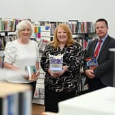 Justice Minister Naomi Long marked Book Week NI in a visit to the library at Hydebank Wood Secure College and Female Prison where she is pictured with Prison Librarian Deborah Martin and Hydebank College Governor Richard Taylor.  Picture: Michael Cooper