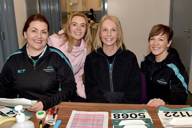 Working hard behind the scenes at the Portadown Festival of Running are members of Portadown Running Club, including from left, Janine Maher, Ciara Burnett, Vicki Graham and Linda Glass. PT11-207.