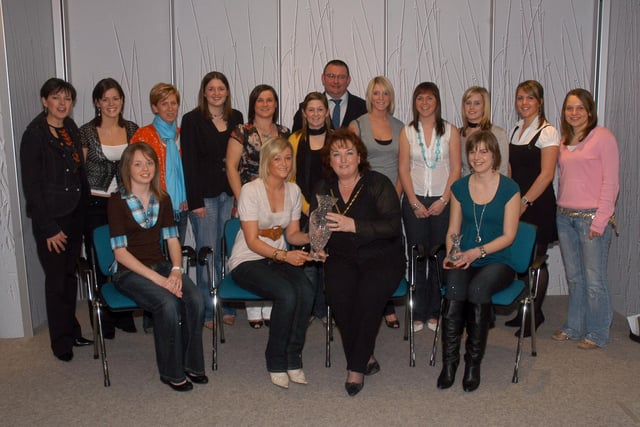 Deputy Mayor Mary McAllinden presents the Councillor Mrs Mary McNally Memorial Award to the members of Lurgan Ladies Hockey Club at the Craigavon Sports Awards in 2007.