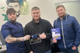Carrick Eats owner Andrew Creighton (far right) with Aron from Street Hawker and competition winner Matthew.