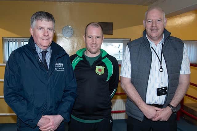 Housing Executive Assistant Area Manager Roy McClean, All Saints boxing coach Brendan Dunne and Housing Executive Good Relations Officer John Read pictured at All Saints Amateur Boxing Club in Ballymena