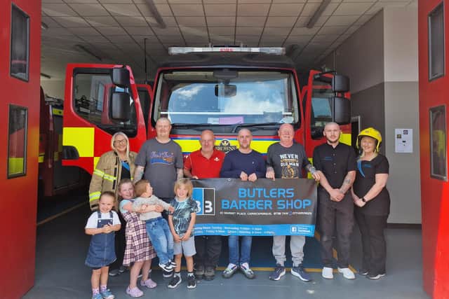 ‘Brave the shave’ took place on Saturday, August 5 at Carrickfergus Fire Station, with the help of staff rom Butlers’ Barbers in the town.  Photo: Jeanna Robb