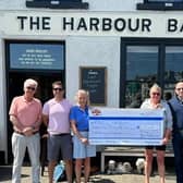 From left - Brian Moore (Raft Race Compere), Matt McAlpin (Ramore Complex), Caroline Owens (Raft Race Committee member), Alison Conn (Raft Race Committee member), 
 Andy Oliver (Exorna Kitchens and Bedrooms), Trevor Abernethy (Chairperson of the Portrush Raft Race Committee).