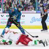 Belfast Giants' Joe Cassetti with Cardiff Devils' Cody Donaghey during Saturday night's pre-season game at the SSE Arena, Belfast.   Photo by William Cherry/Presseye