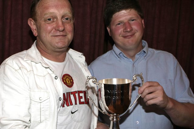 Pictured are Billy Gillan and Davy Graham with the Alexander Woods Memorial Cup in 2008  at the Ballymoney Darts League presentation night