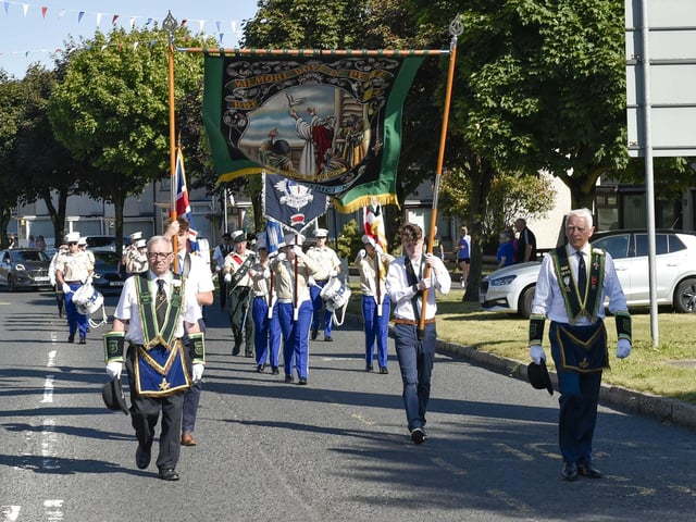 Stepping out in sunshine as they celebrate the 13th in Lurgan.
