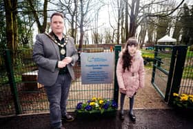 Rosstulla pupil, Arianna Radcliffe and Antrim and Newtownabbey Mayor, Councillor Mark Cooper BEM at the relocated Hazelbank Sensory Garden in Newtownabbey. Pic supplied by Antrim and Newtownabbey Borough Council