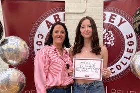 Anna, pictured with her mother, was amongst the 120 students who received the school's best ever set of results.