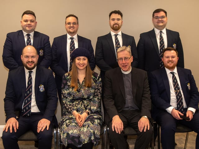 Students at the college pictured with administrator, Alana Nelson and college principal, Rev Timothy Nelson.