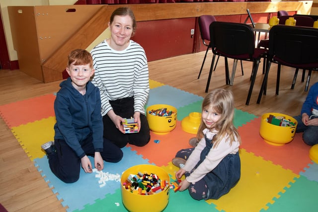 Playing with Lego is what it's all about for Nina Hodgen and her children, Noah (8) and Frida (4) who attended the Lego exhibition on Saturday afternoon. PT15-204.