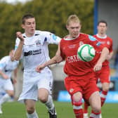 Current Portadown captain Gary Thompson playing against them for Lisburn Distillery in 2011. He's in action against Ross Redman - someone he now calls a teammate. PIC: Stephen Hamilton/Presseye