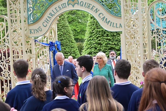 The royal couple enjoy their visit to the new coronation garden. Picture: Colm Lenaghan/Pacemaker