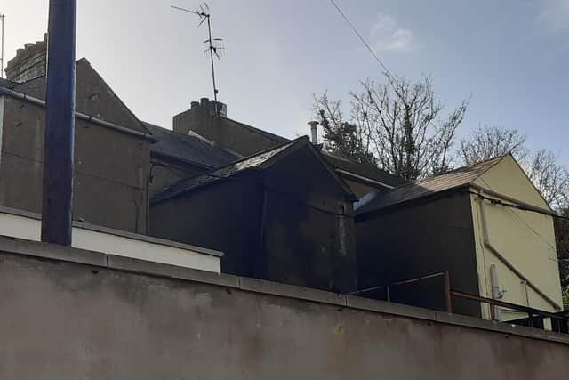 Scene of a fire in Portadown Co Armagh. A woman, aged 37, has lost her life. One man has been arrested on suspicion of murder, attempted murder and arson with intent to endanger life.