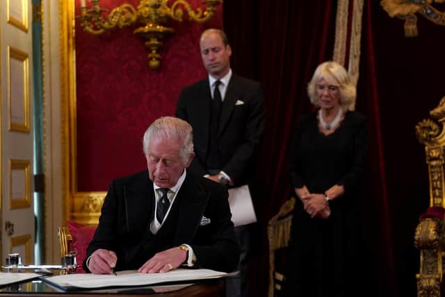 King Charles III signs an oath to uphold the security of the Church in Scotland during the Accession Council at St James's Palace, London, where King Charles III is formally proclaimed monarch. Charles automatically became King on the death of his mother, but the Accession Council, attended by Privy Councillors, confirms his role. Photo credit: Victoria Jones/PA Wire