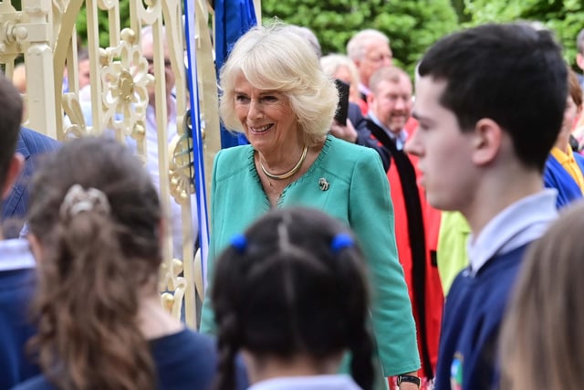 Queen Camilla enjoys her visit to the newly-created Coronation Garden in Newtownabbey, designed by Diarmuid Gavin. Picture Colm Lenaghan/Pacemaker