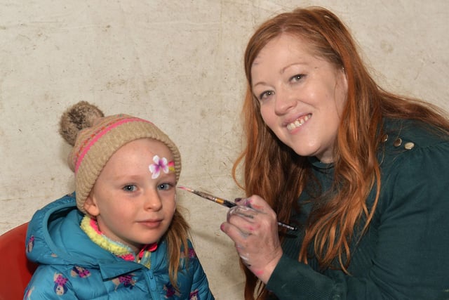 Sadie White (5) loves having her face painted at the Richhill Apple Harvest Fayre by Michelle Lavery of 'Making Faces'. PT44-235.